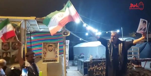 نمایش شور و همبستگی؛ پیرمرد عراقی با پرچم ایران در نجف